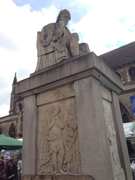 Dr Samuel Johnson looks down on Lichfield Market, wishing he had a copy of Astounding to read